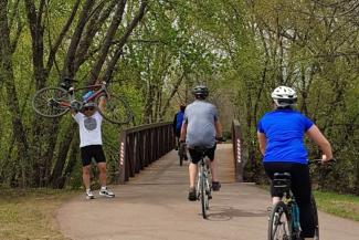 Bryan Ruby showing off on the Sioux Falls Bicycle Trail - Photo Courtesy of Janice Maldonado